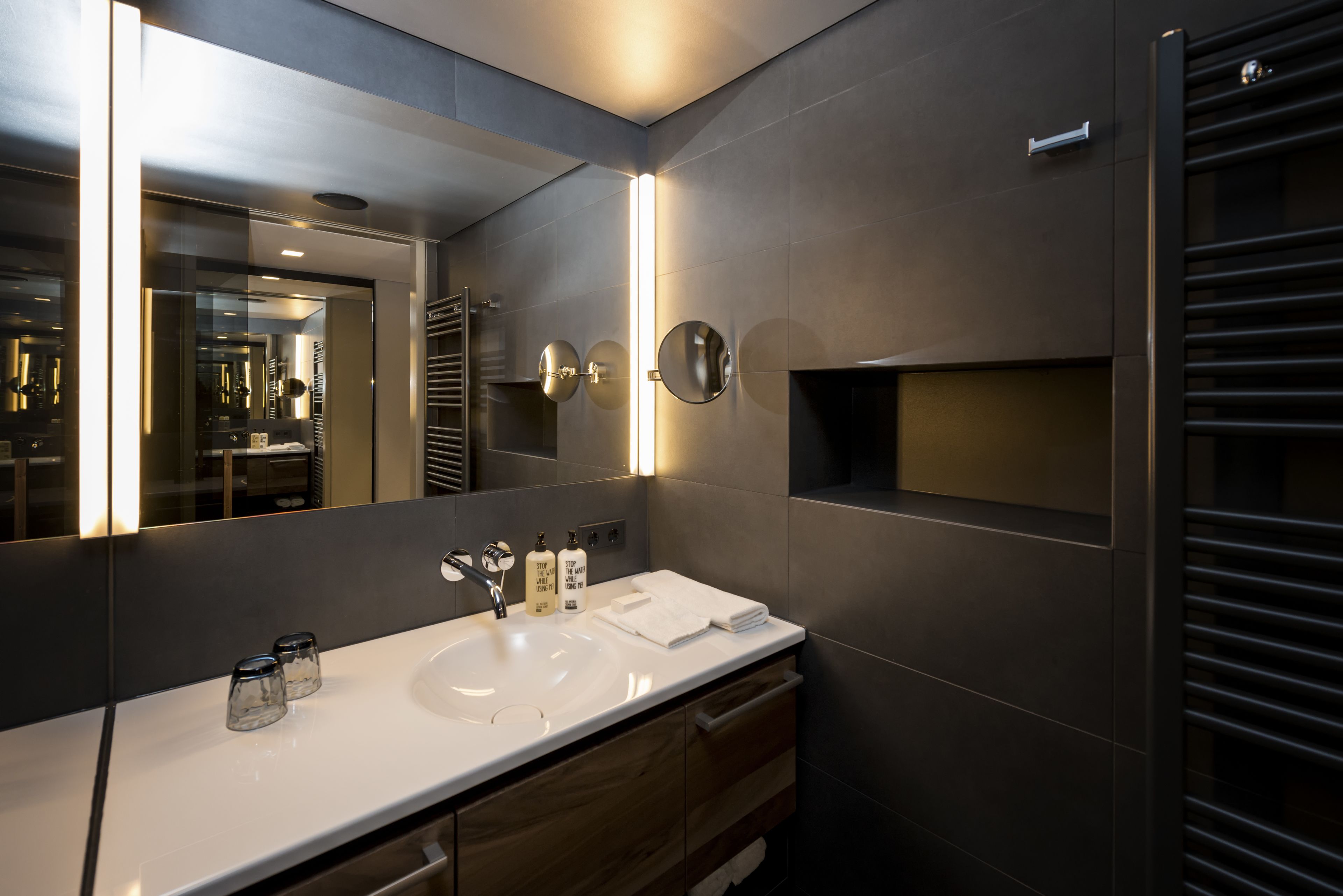 shower, designer toiletries, bathrobes, slippers