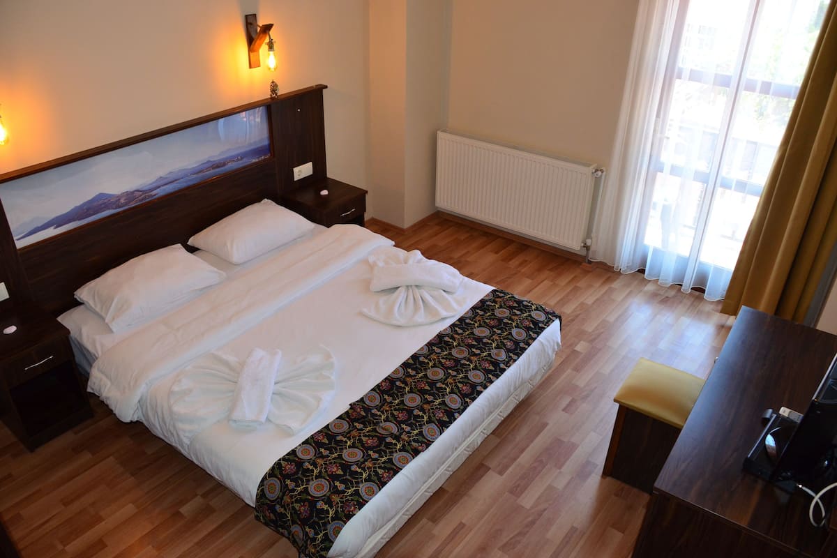 Chambre Familiale | Minibar, bureau, chambres insonorisées, lits bébé (gratuits)