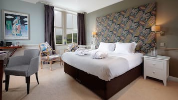 Luxury Suite | Premium bedding, in-room safe, desk, iron/ironing board