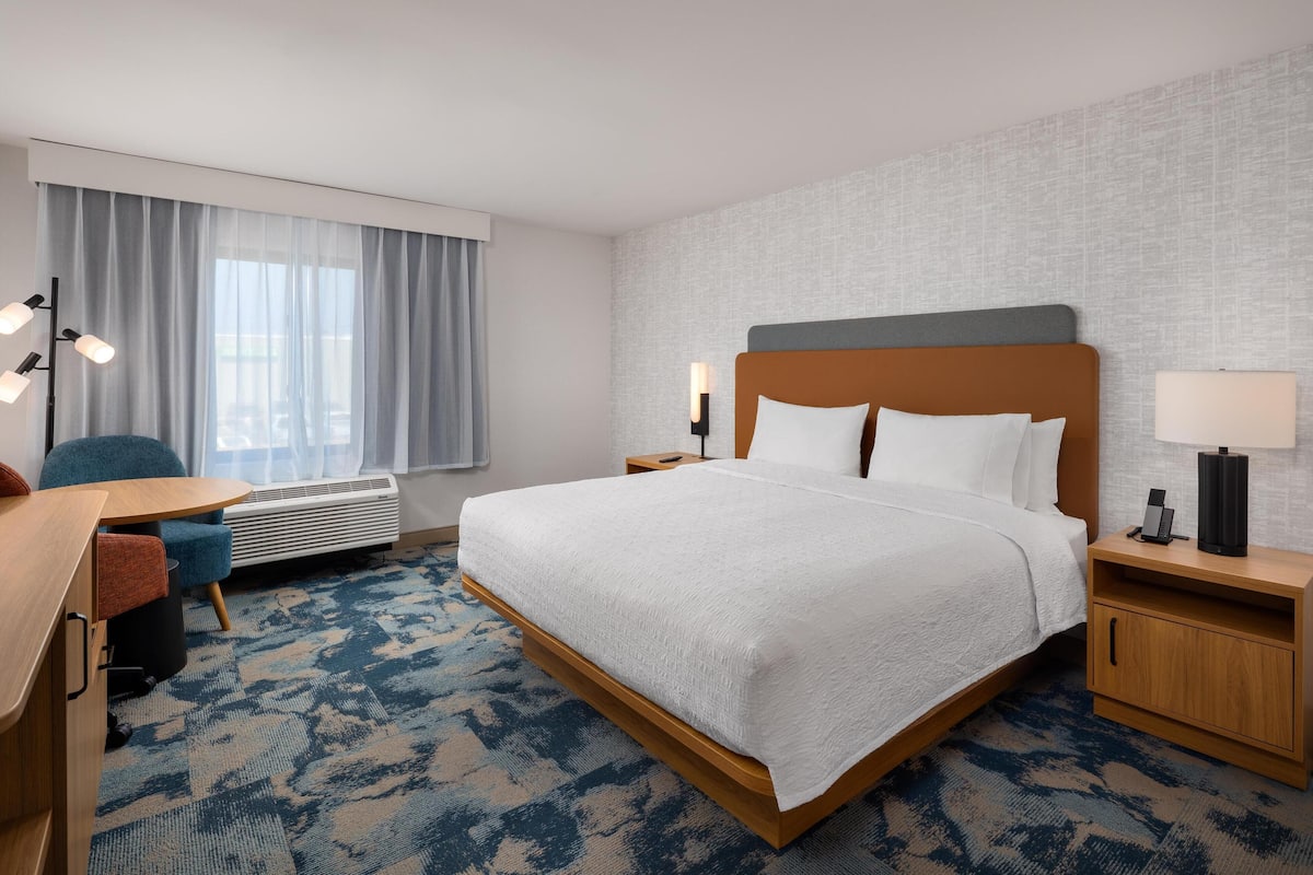 Premium bedding, Tempur-Pedic beds, desk, laptop workspace