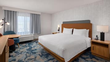 Premium bedding, Tempur-Pedic beds, desk, laptop workspace