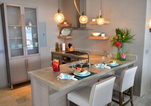 Full-sized fridge, microwave, stovetop, dishwasher