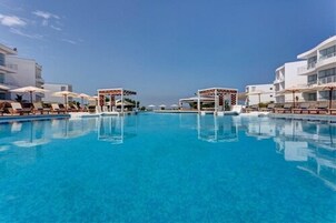 Outdoor pool, pool umbrellas, sun loungers