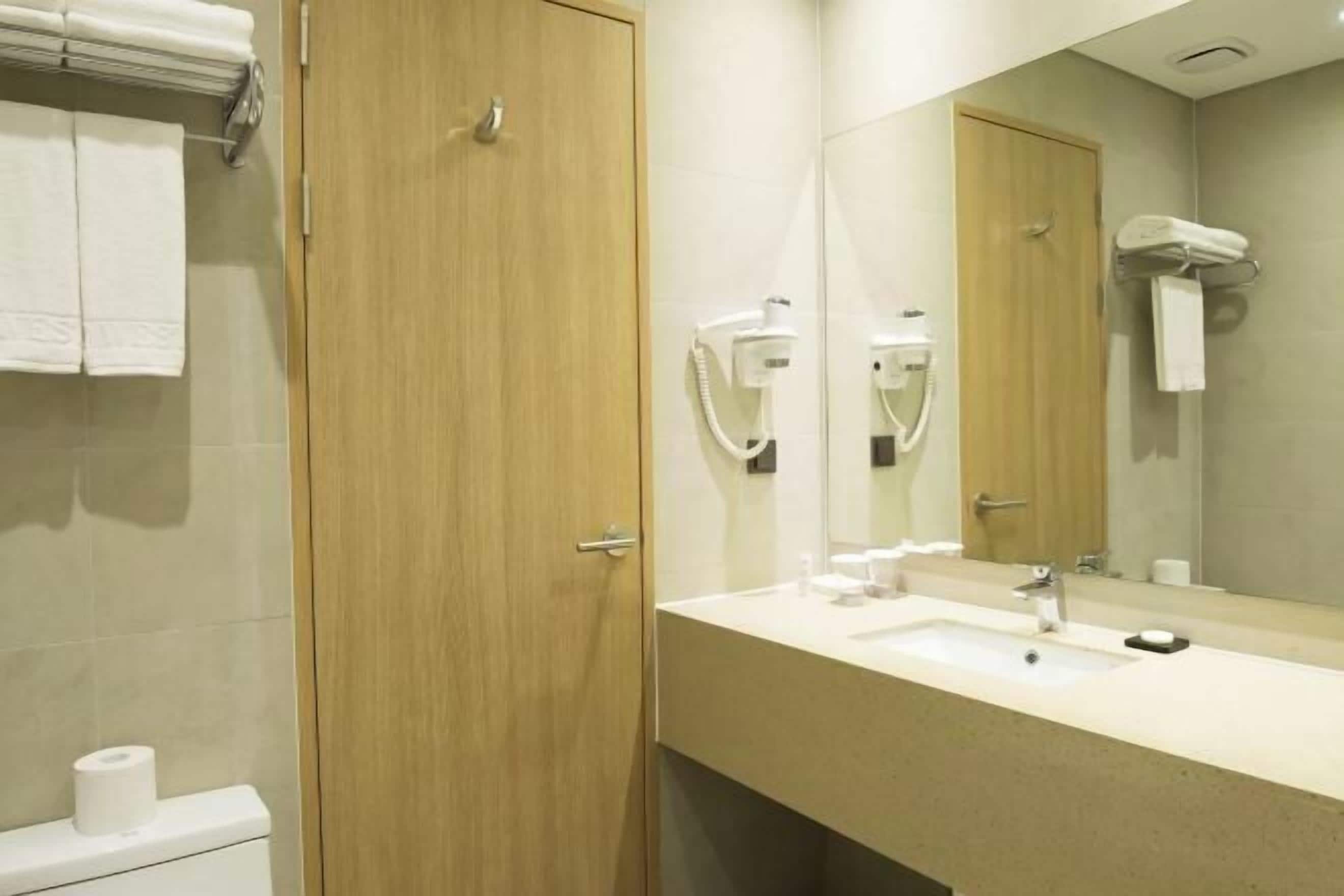 Bathroom | Shower, hair dryer, slippers, towels