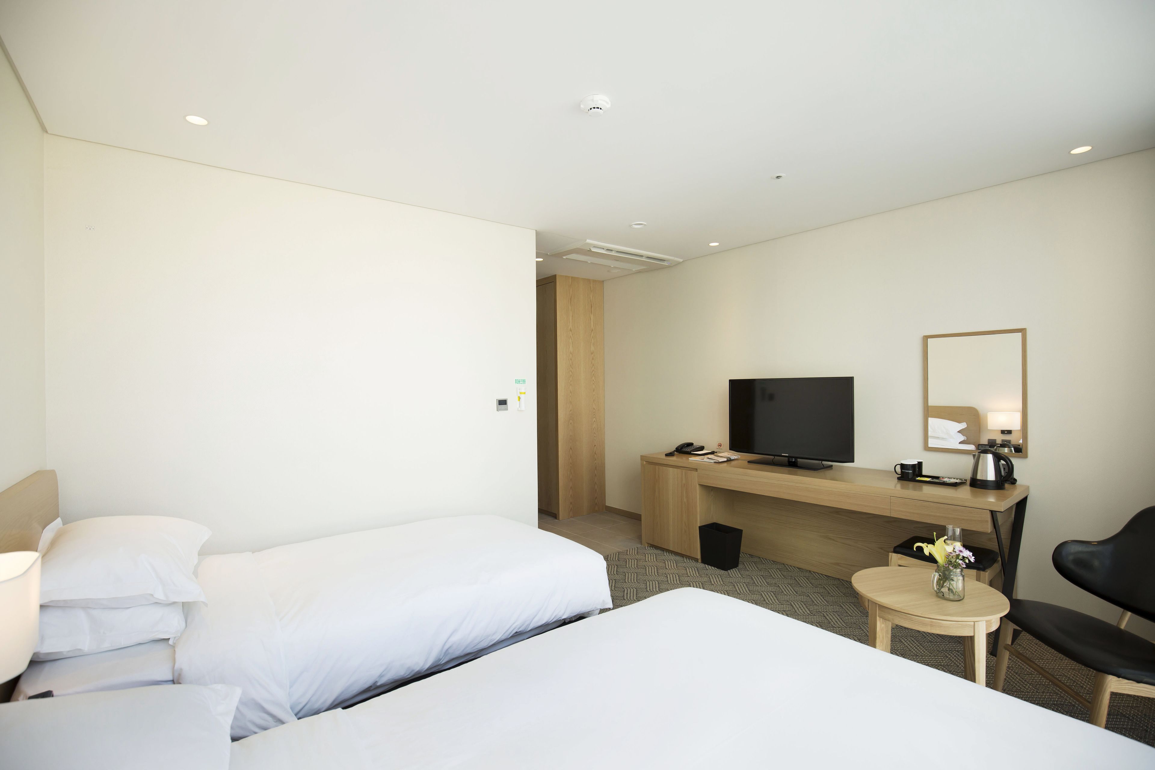 standard room, multiple beds, city view | premium bedding, desk, soundproofing, iron/ironing board