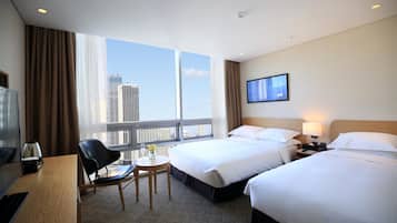 Standard Room, Multiple Beds, City View | Premium bedding, desk, soundproofing, iron/ironing board