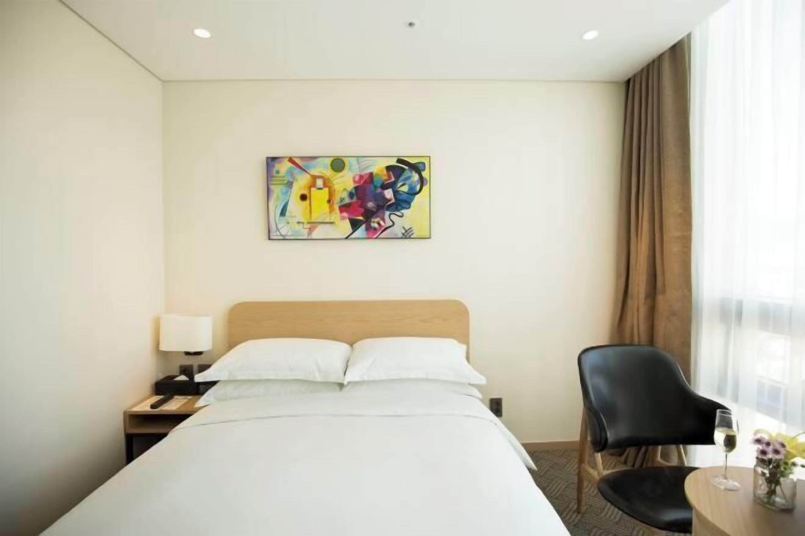 Premium bedding, desk, soundproofing, iron/ironing board