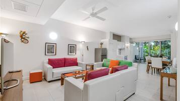 Family Apartment, 2 Bedrooms, Patio, Garden View | Living area | Flat-screen TV