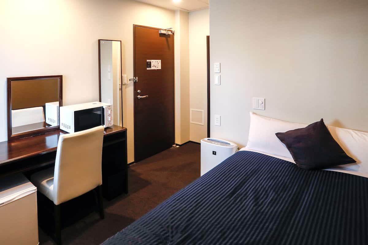Desk, free WiFi, bed sheets