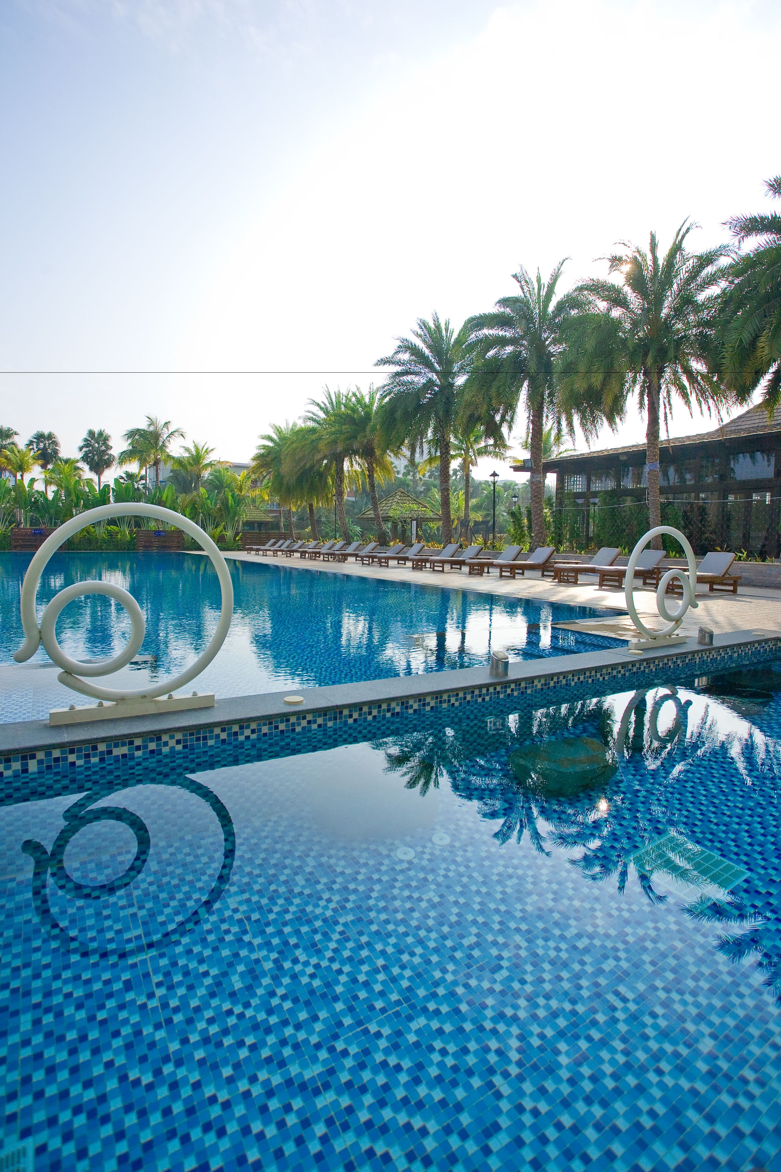 outdoor pool, open 6:30 am to 10 pm, pool loungers
