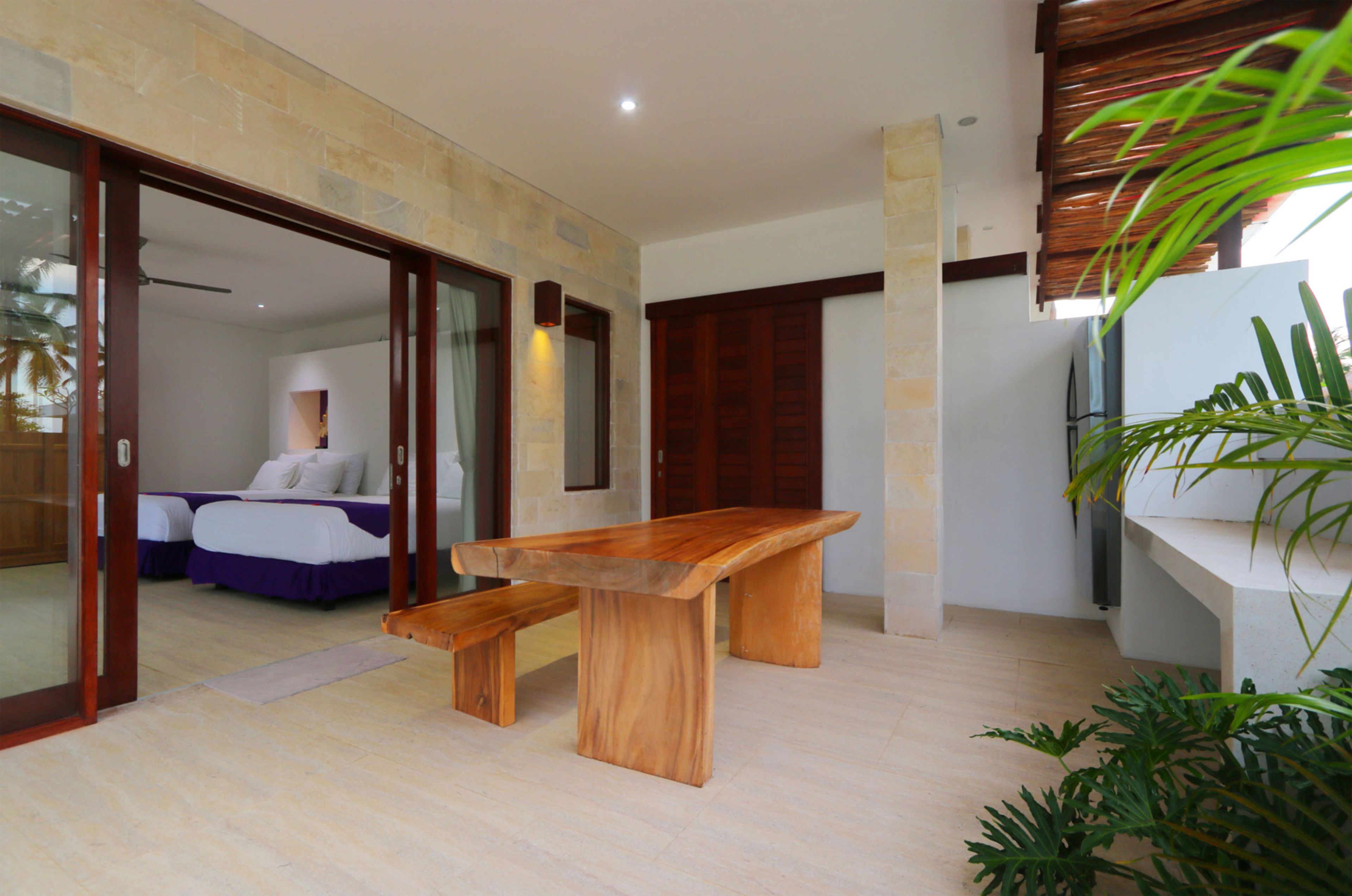 Villa, alberca privada | Minibar, caja de seguridad en la habitación y escritorio 