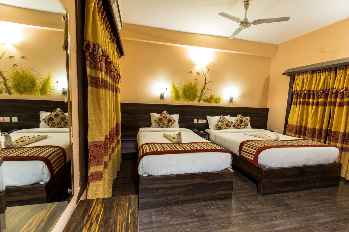Deluxe Twin Room, Garden Area | In-room safe, desk, iron/ironing board (on request)