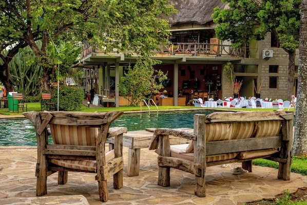 Outdoor pool, pool umbrellas, pool loungers