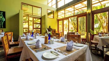 Breakfast, lunch, dinner served; local cuisine, garden views
