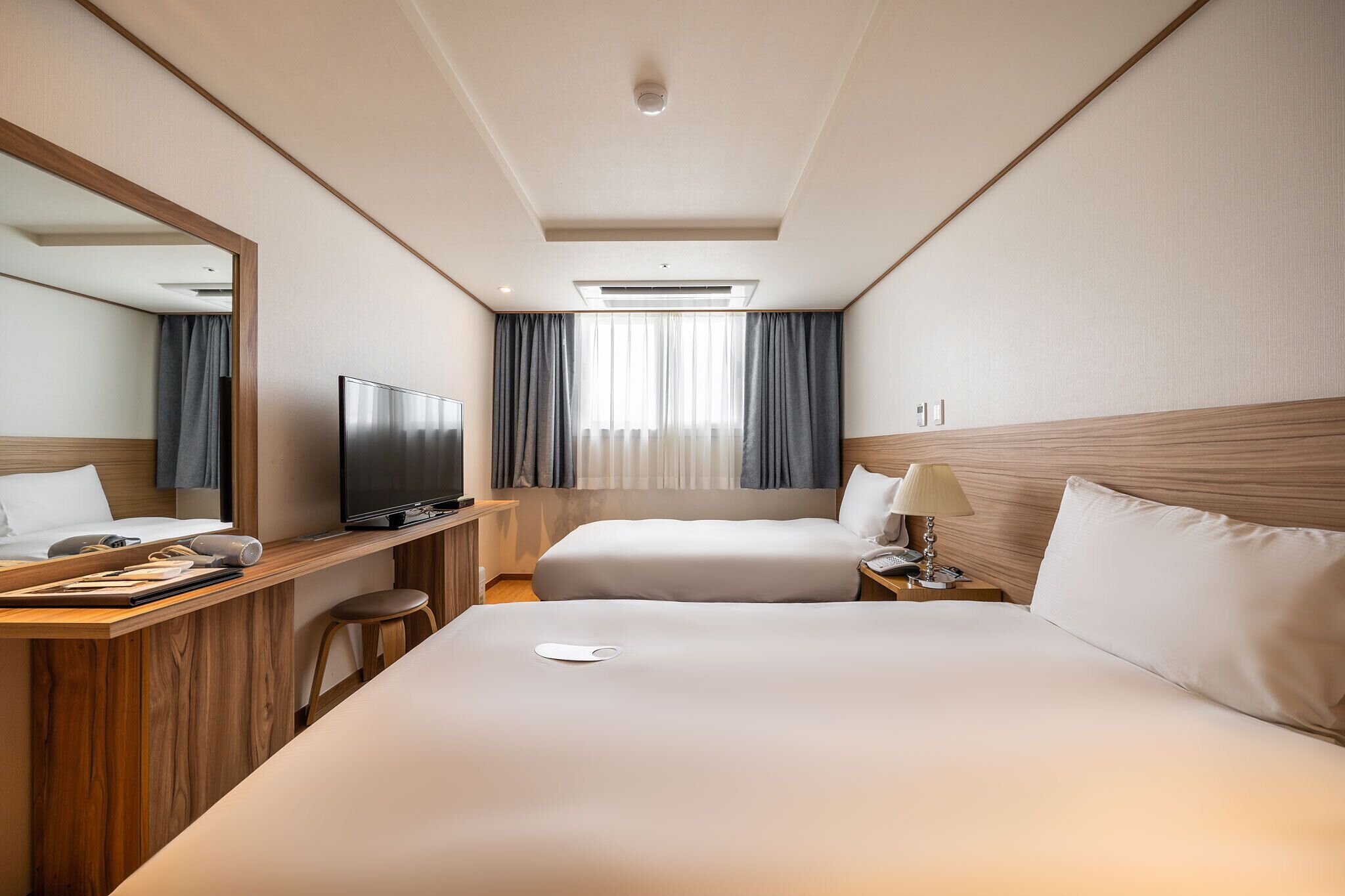 standard twin room | egyptian cotton sheets, premium bedding, down duvets