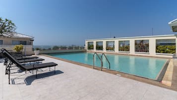 Outdoor pool, sun loungers