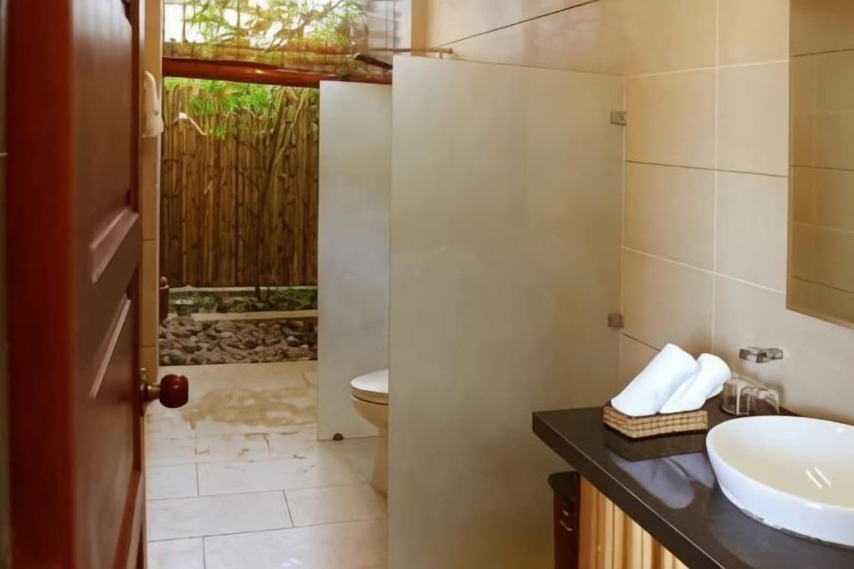 Bathroom | Shower, free toiletries, hair dryer, bathrobes