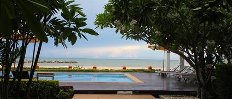 Outdoor pool, pool umbrellas, pool loungers
