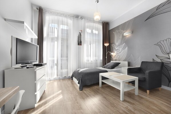 Premium bedding, soundproofing, iron/ironing board, cots/infant beds - Apartamenty Pomarańczarnia (Poznan)