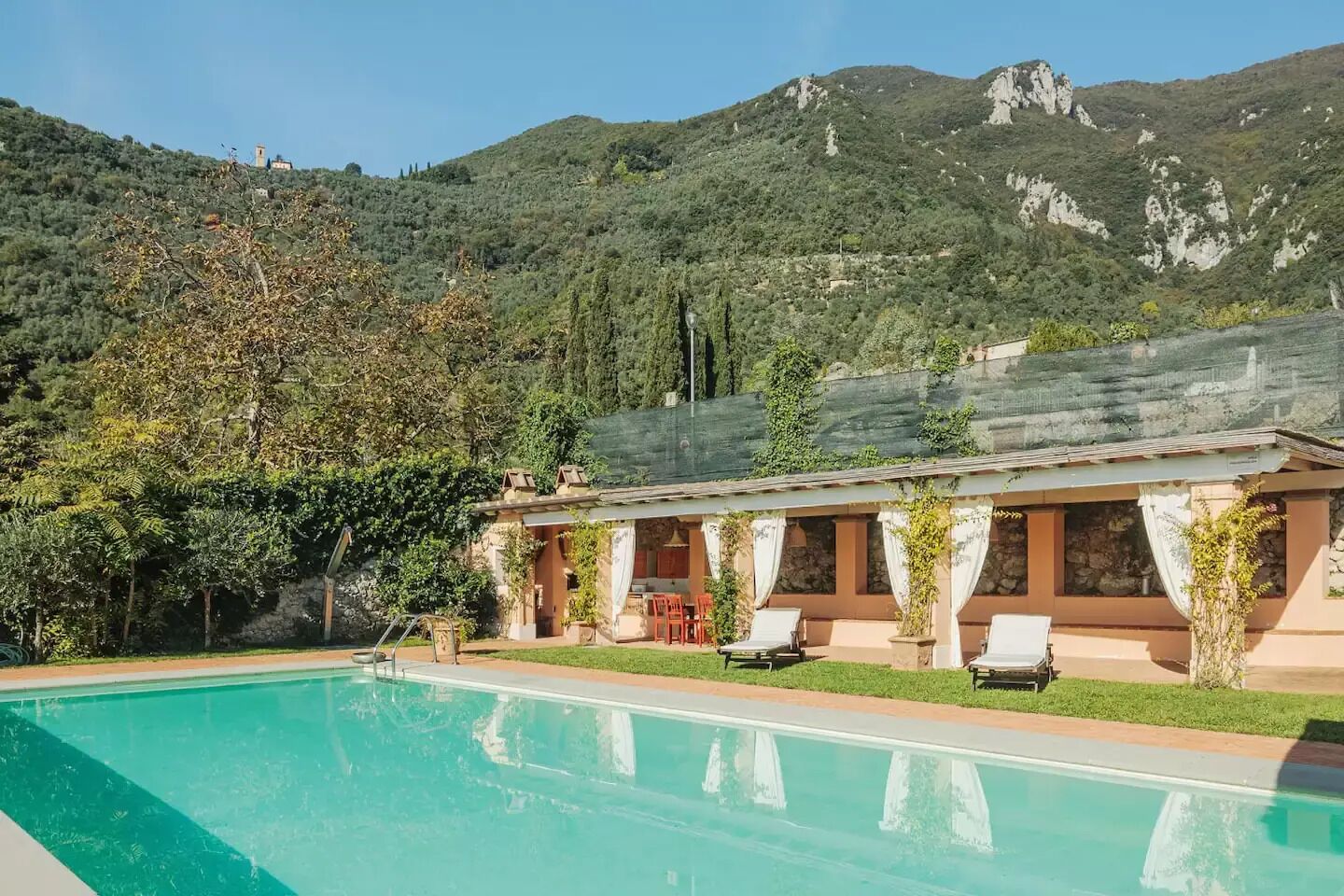 Outdoor pool, pool umbrellas, pool loungers