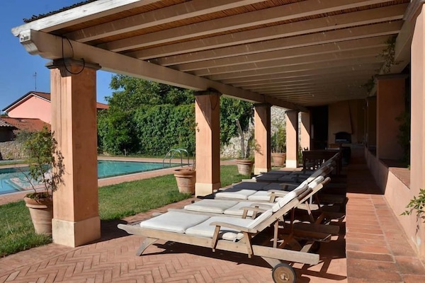 Outdoor pool, pool umbrellas, pool loungers