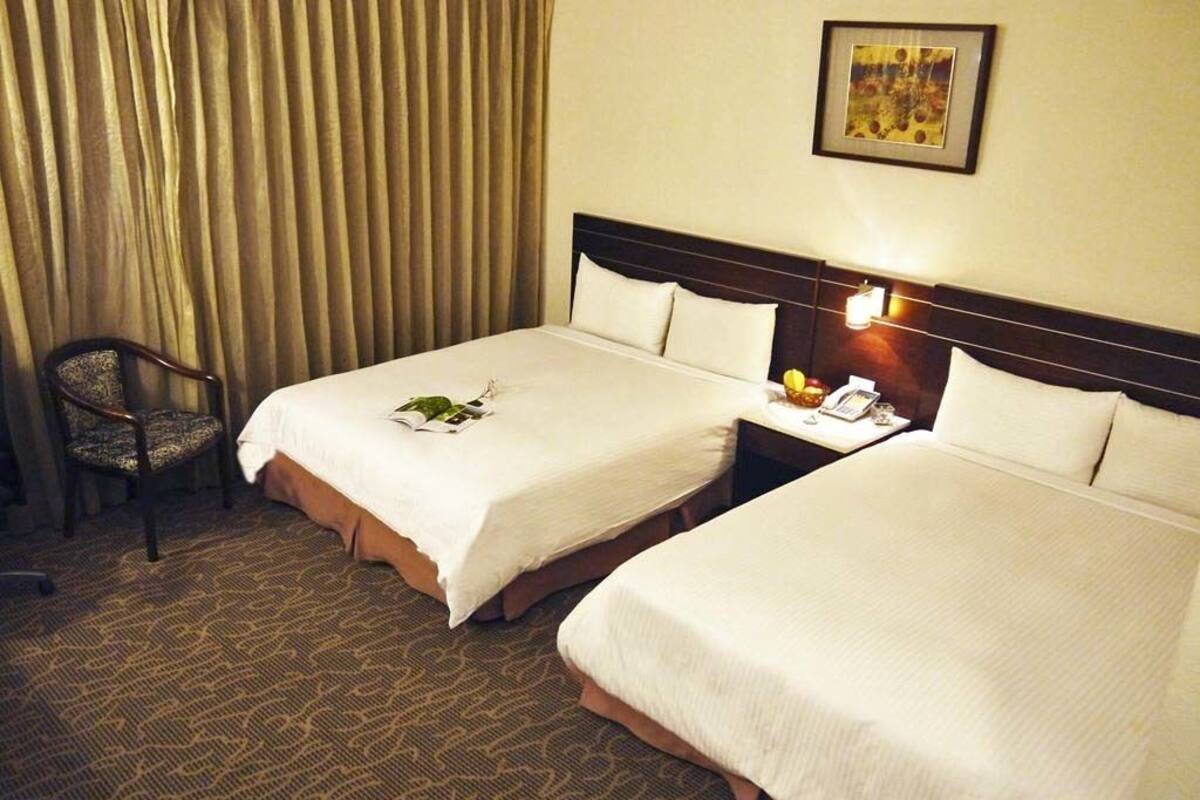Deluxe Quadruple Room, Bathtub | Down duvets, in-room safe, desk, blackout curtains