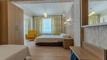 Triple Room | Premium bedding, minibar, in-room safe, desk