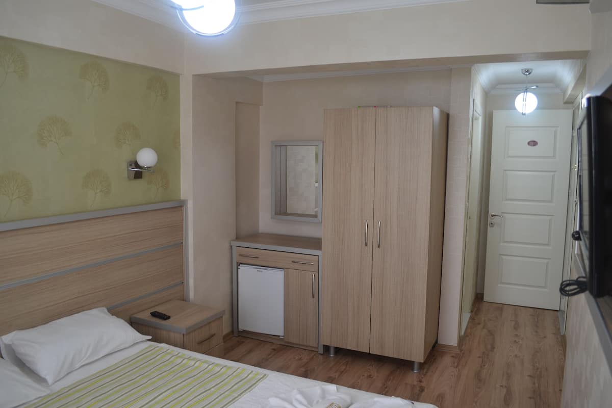 Ropa de cama de alta calidad y minibar