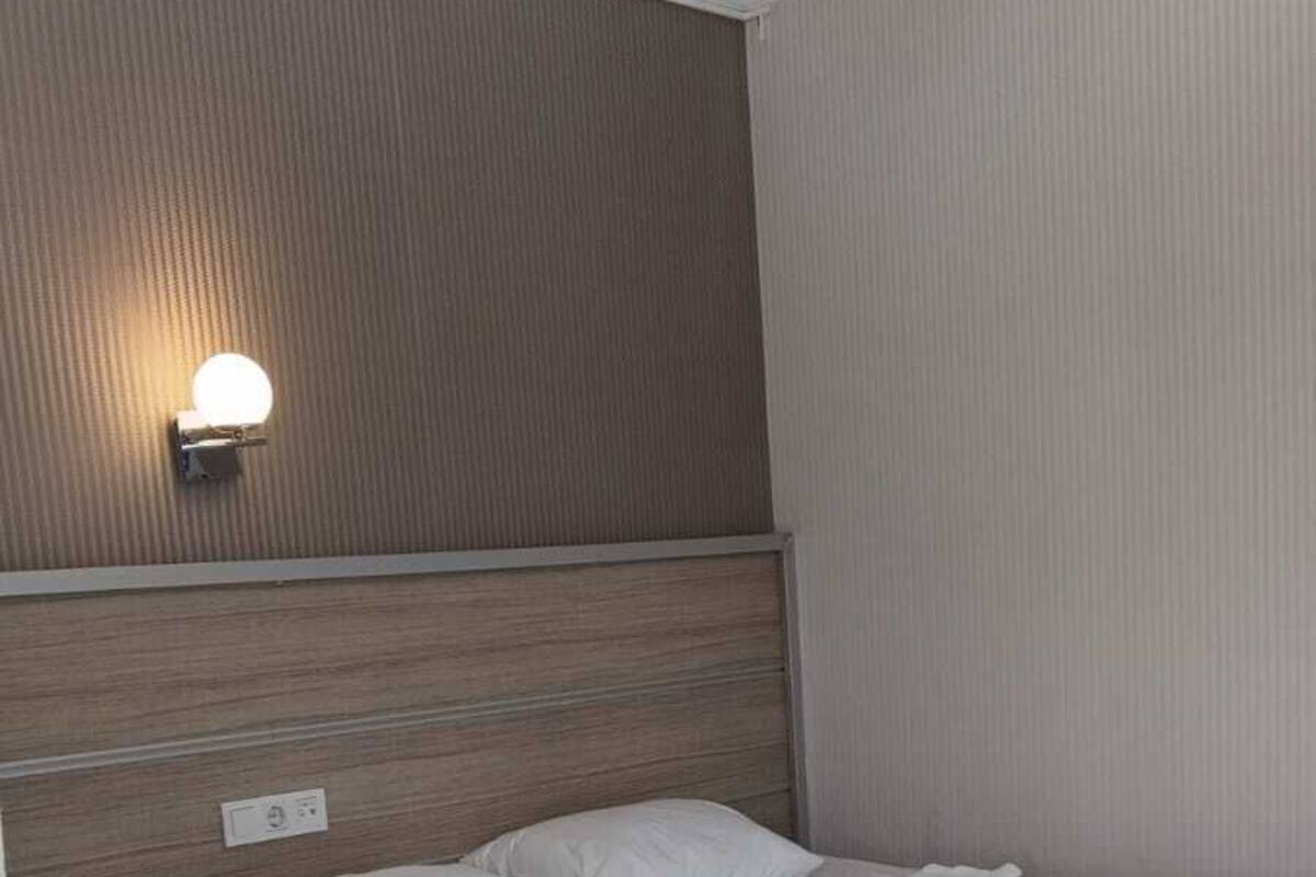 Chambre économique | Literie de qualité, minibar, coffre-fort, système d’insonorisation