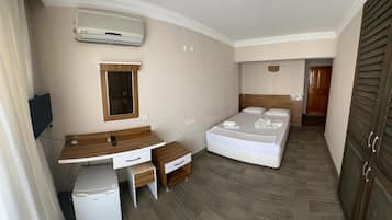 Habitación estándar doble | Ropa de cama de alta calidad, minibar, sistema de insonorización