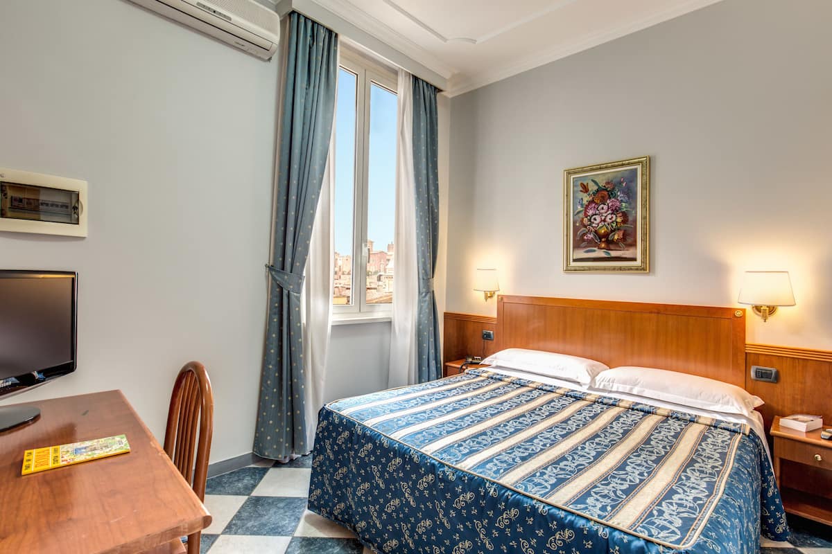Premium bedding, down duvets, in-room safe, laptop workspace