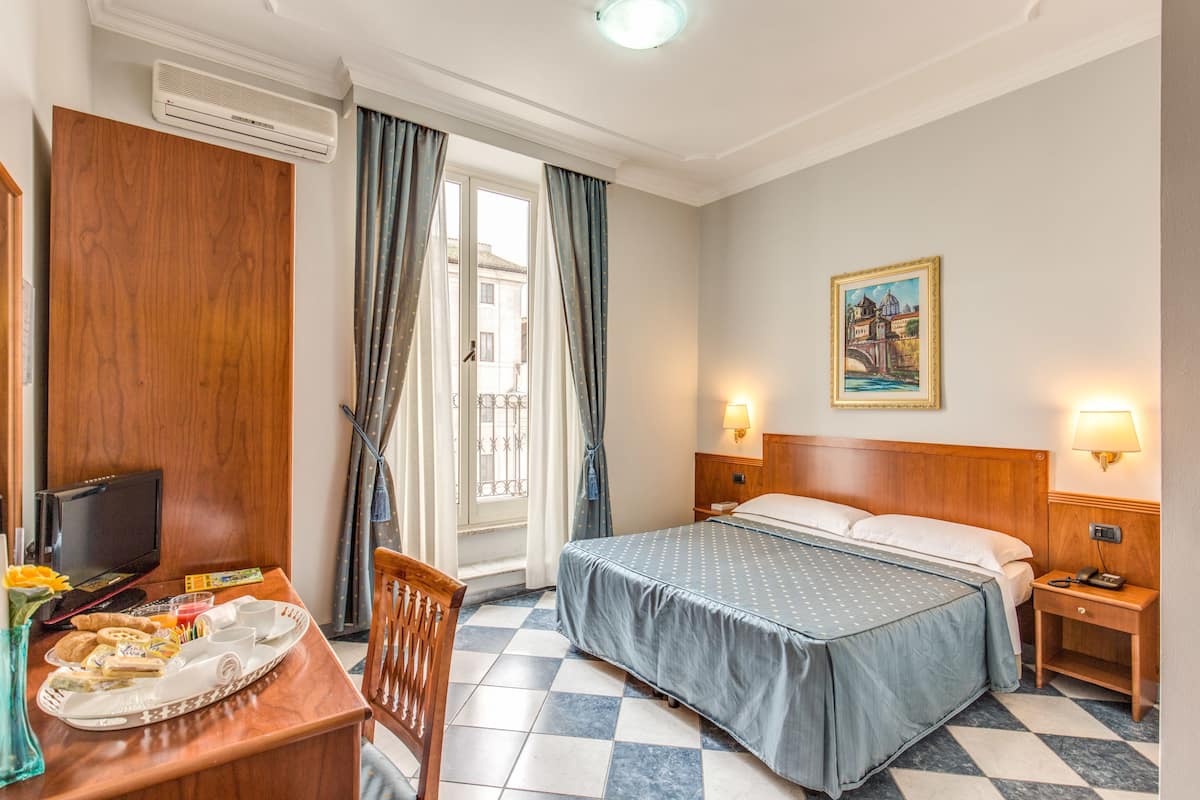 Premium bedding, down duvets, in-room safe, laptop workspace
