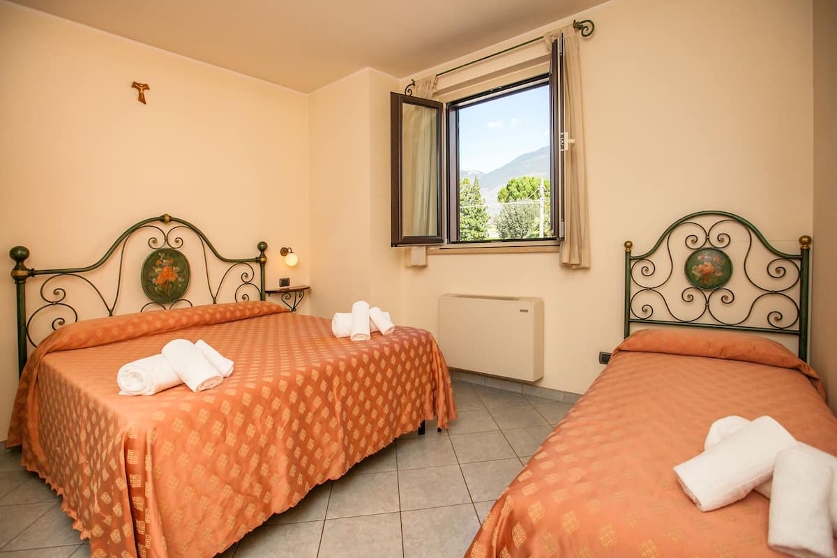 Triple Room | Egyptian cotton sheets, down comforters, individually decorated, desk