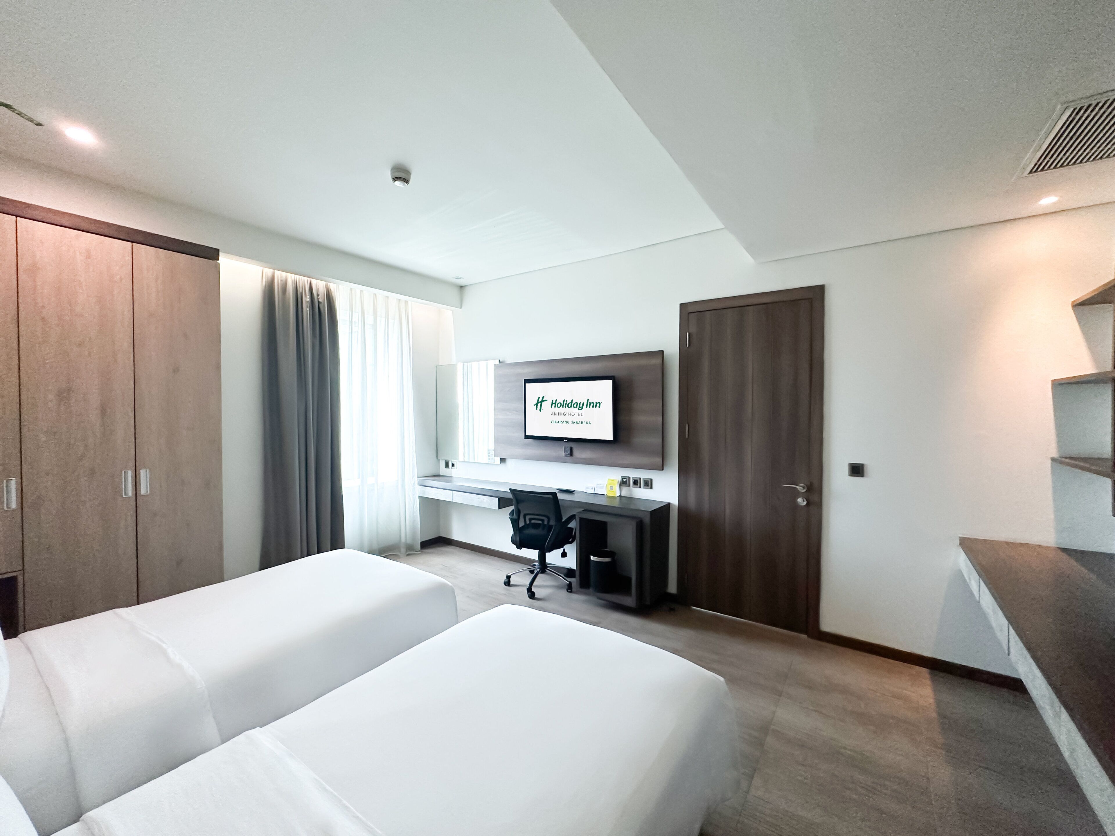 Ropa de cama de alta calidad y minibar 