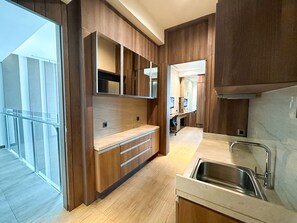 Suite, 3 Bedrooms | Private kitchenette | Fridge, coffee/tea maker, highchair - Holiday Inn Cikarang Jababeka by IHG (Cikarang)