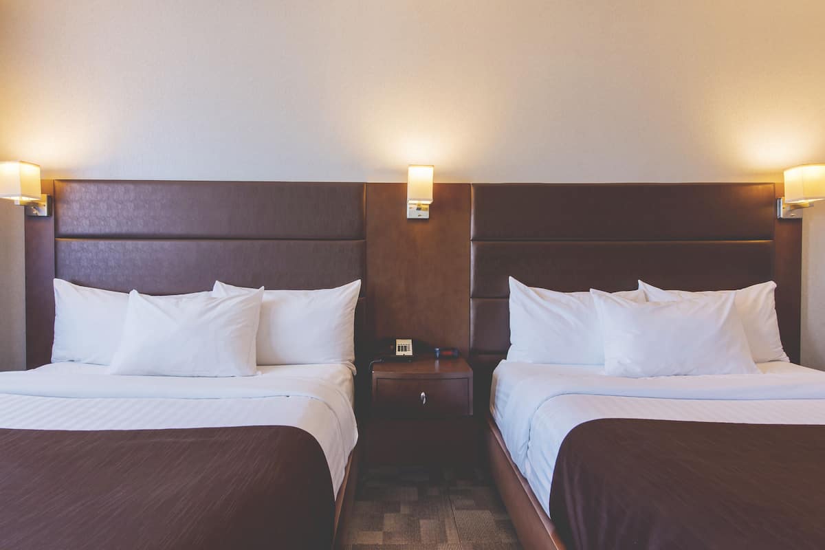 superior room, 2 queen beds | desk, soundproofing, iron/ironing board, free cots/infant beds