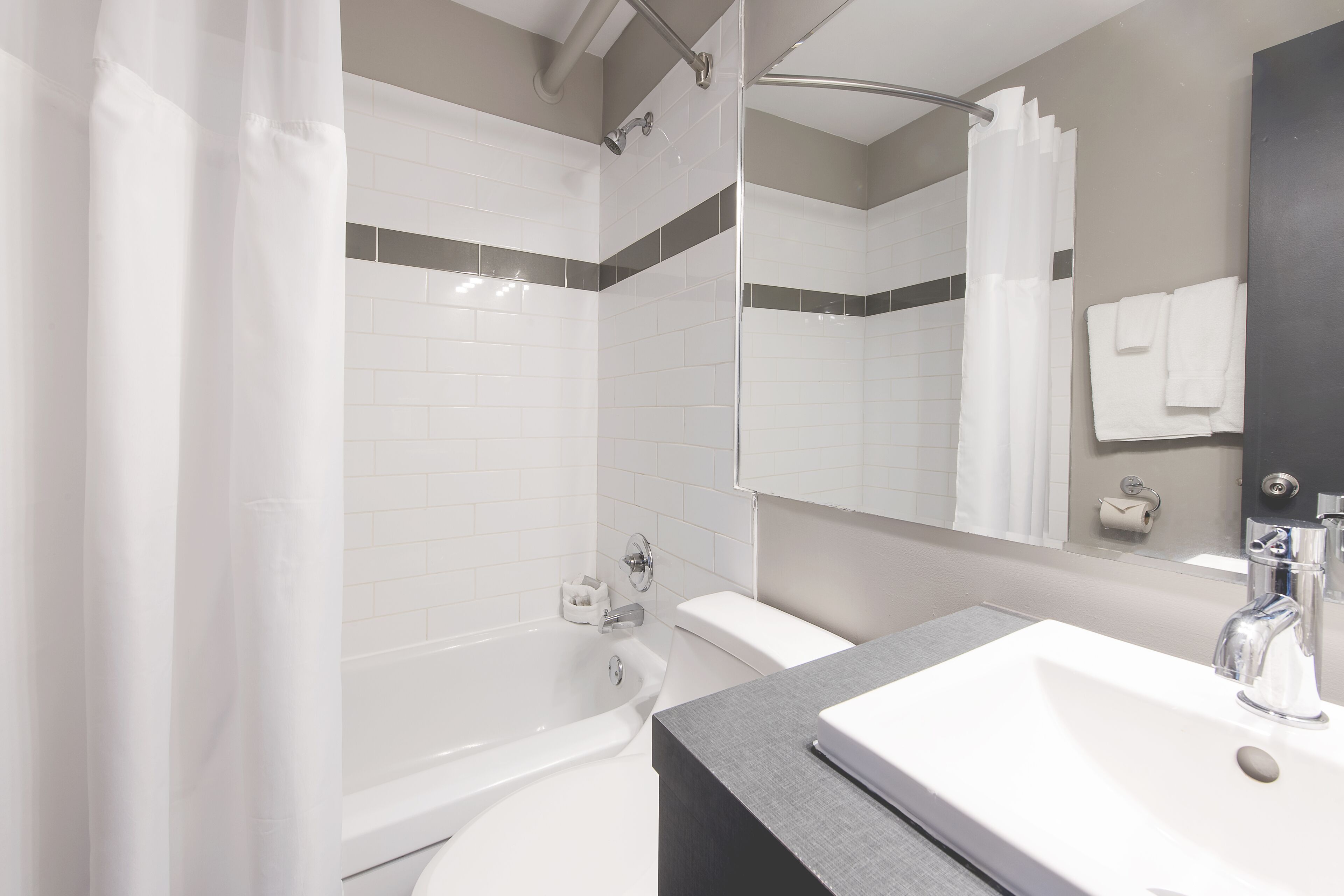 combined shower/bathtub, free toiletries, hair dryer, towels