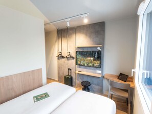 Habitación estándar, 2 camas individuales | Escritorio, cortinas opacas, cunas gratuitas y wifi gratis
