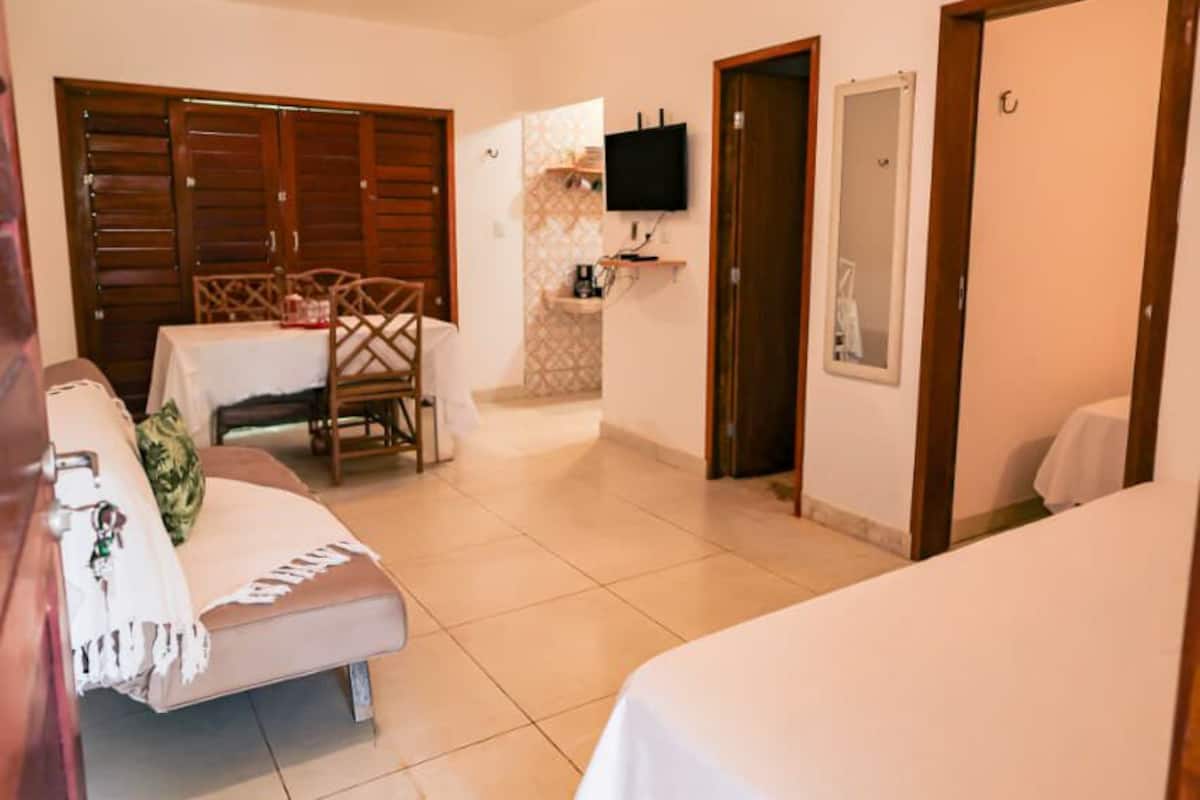 Chalé Família Deluxe, vista para o mar | 1 habitación, ropa de cama de alta calidad y minibar