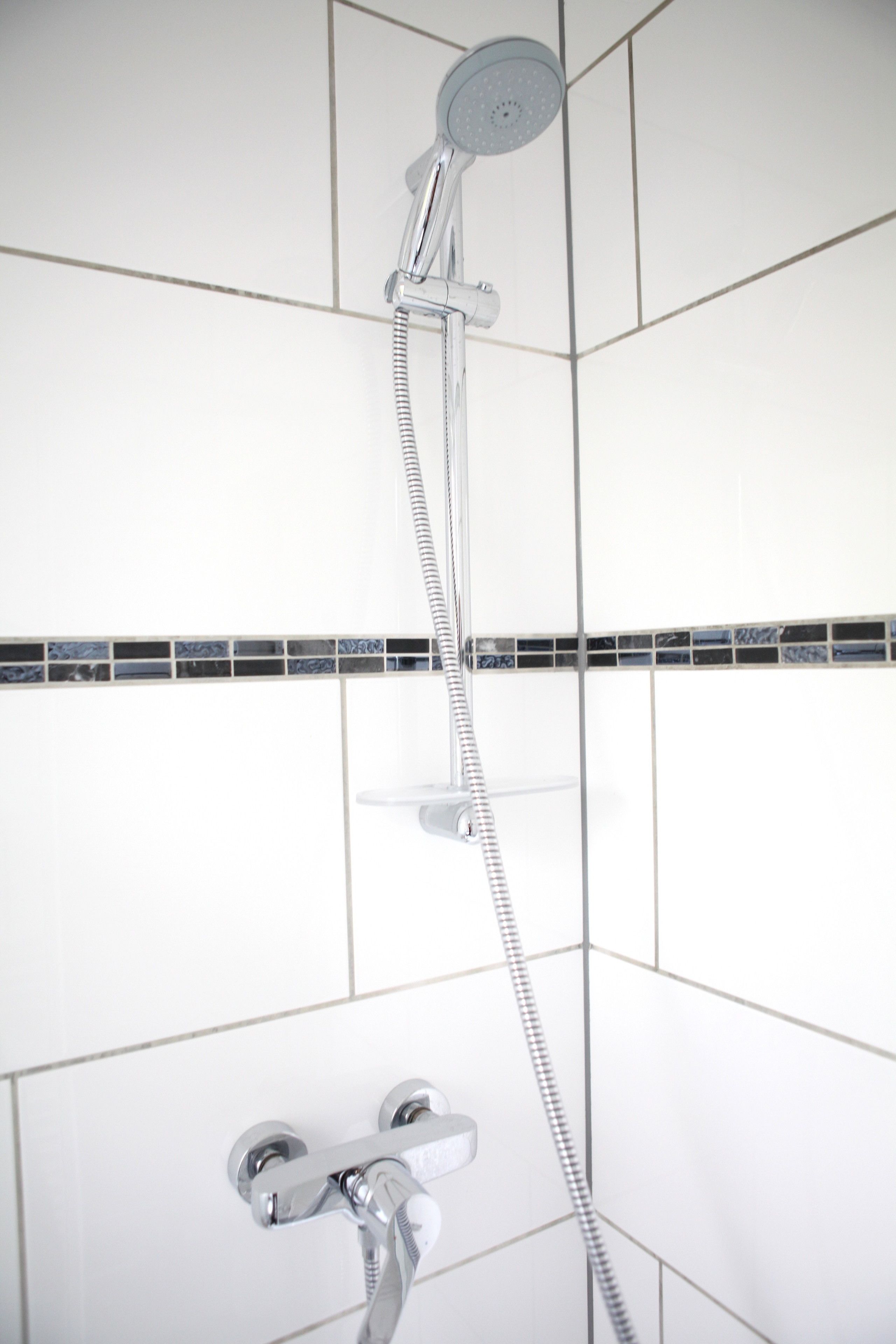 Comfort appartement, uitzicht op stad (Dibergstraße 50) | Badkamer met douche