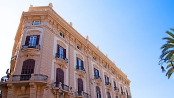 A historic building with ornate architectural details, including columns and decorative moldings.