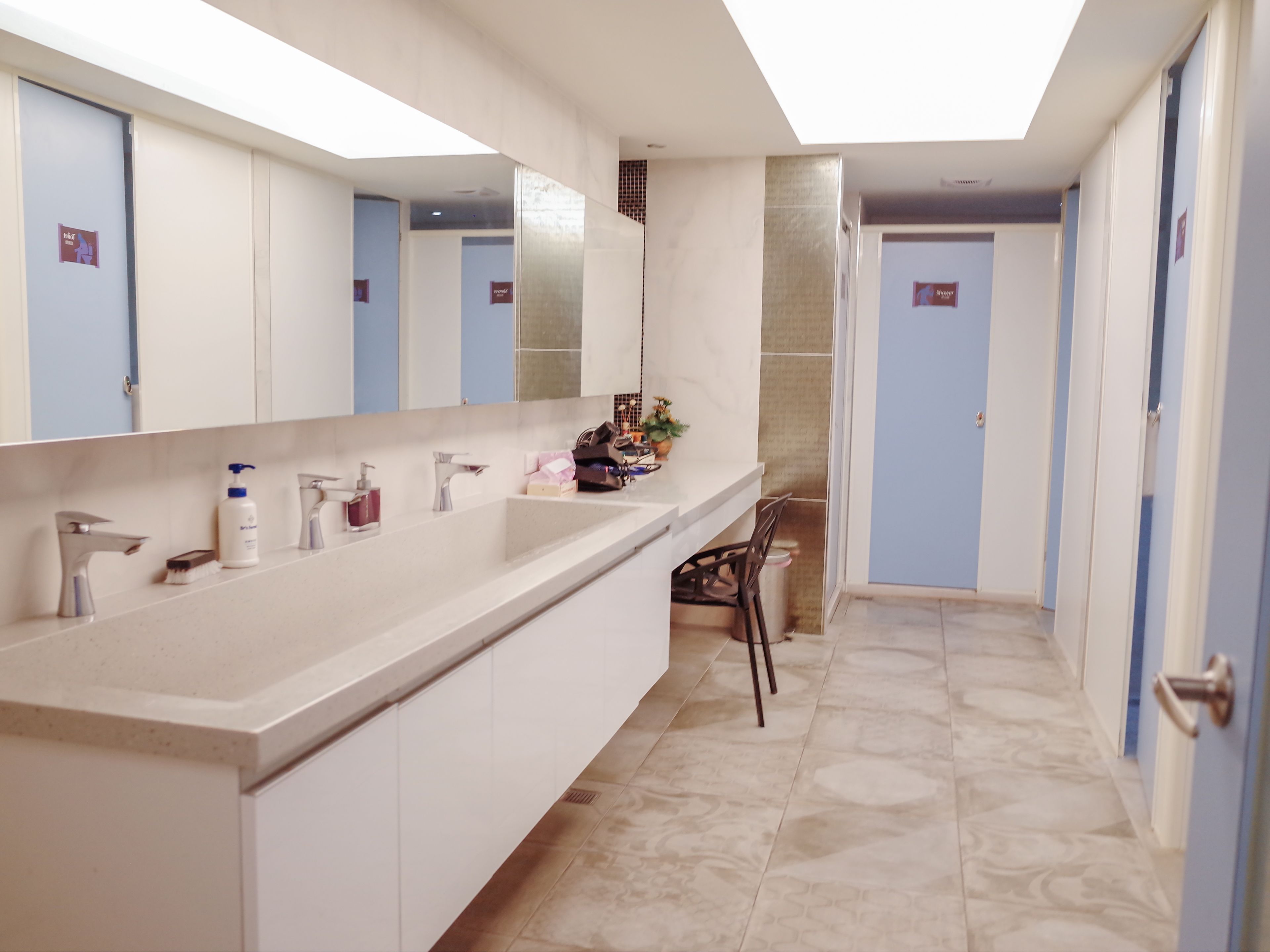 Shower, hair dryer, slippers, towels