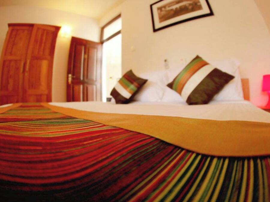 Premium bedding, in-room safe, blackout drapes, soundproofing