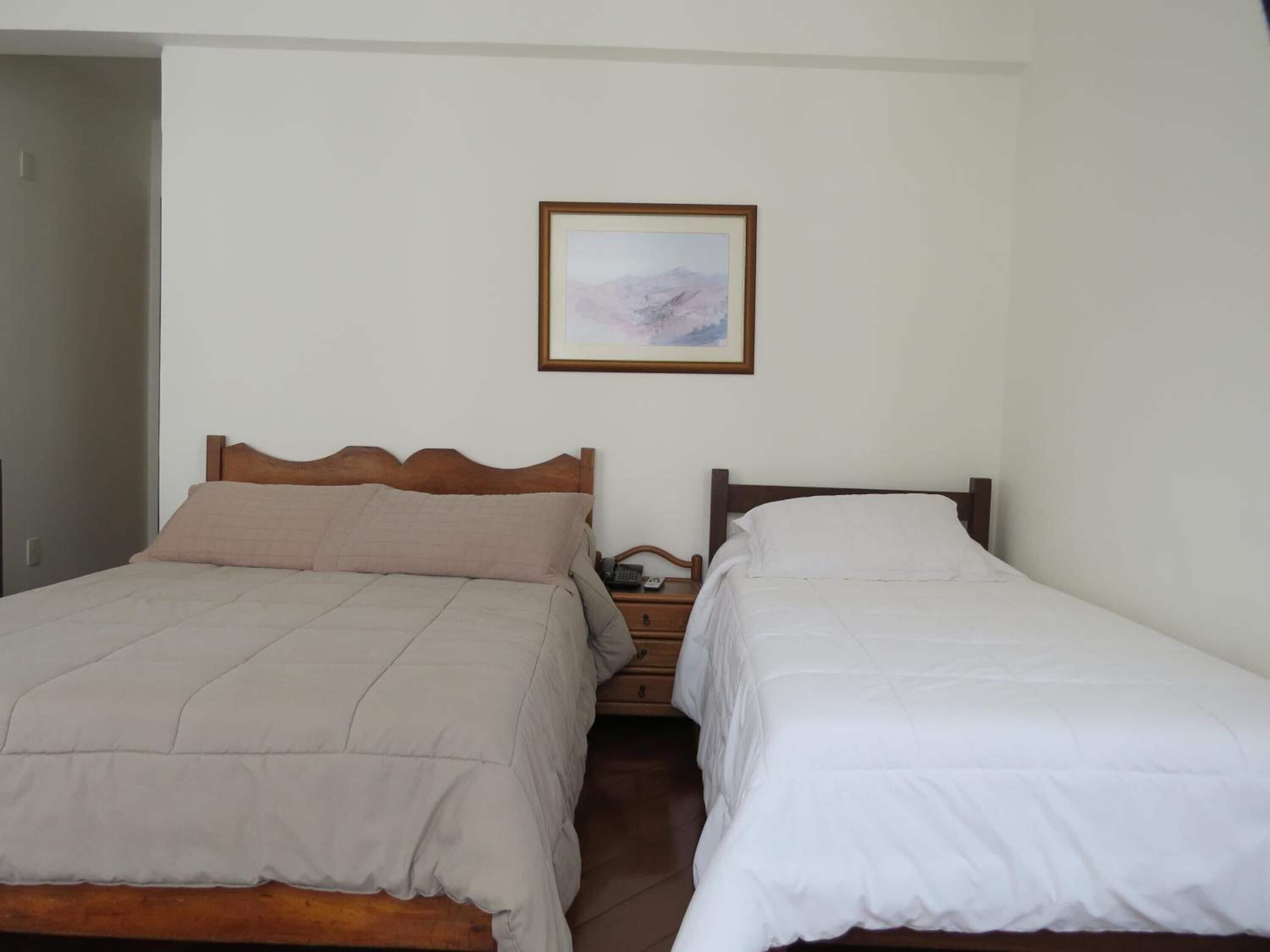 Quarto quádruplo | Frigobar, escrivaninha, berços grátis, Wi-Fi de cortesia