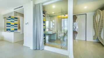 Suite Room | Bathroom | Shower, rainfall showerhead, hair dryer, bathrobes