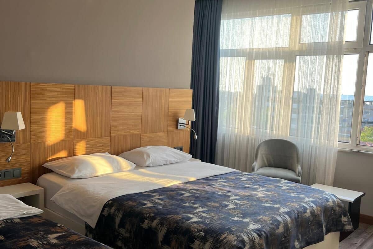 Classic Triple Room | 1 bedroom, premium bedding, free minibar, in-room safe
