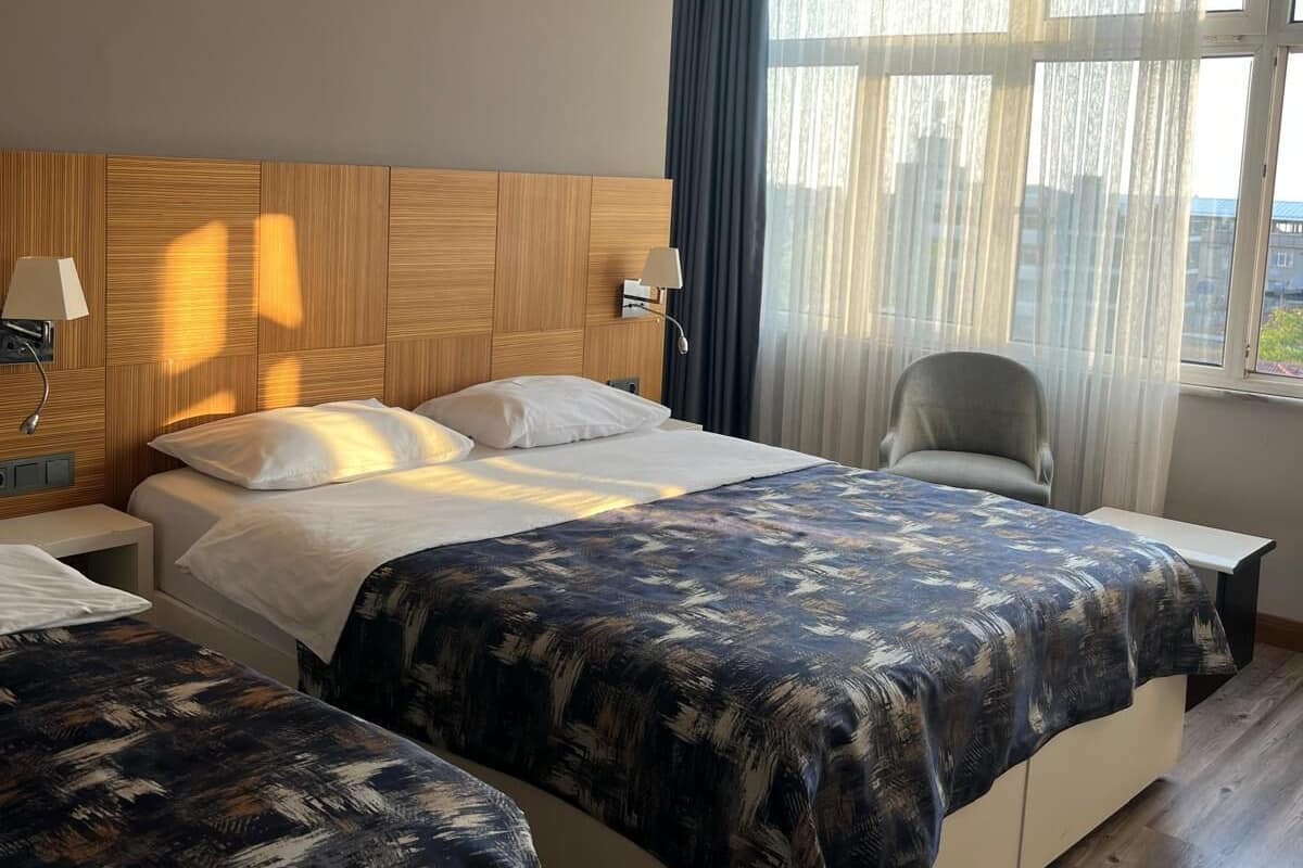 Classic Triple Room | 1 bedroom, premium bedding, free minibar, in-room safe