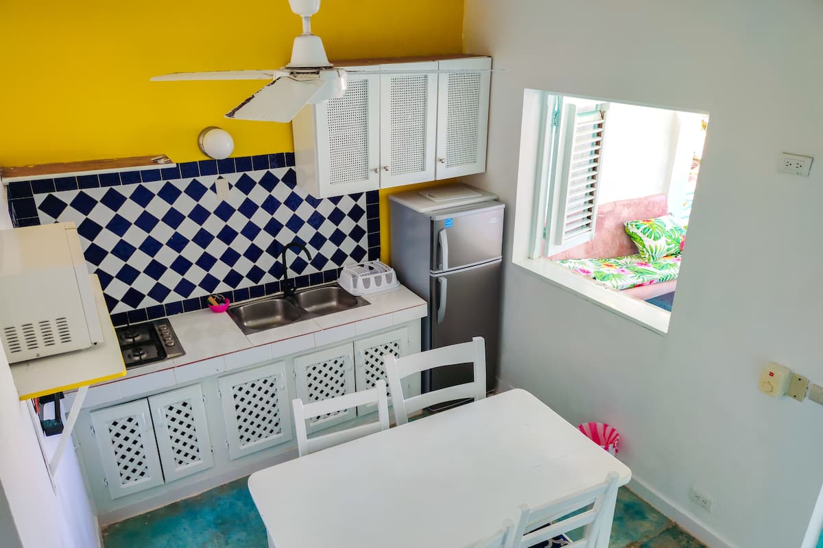 family house | private kitchen | fridge, microwave, stovetop, cookware/dishes/utensils