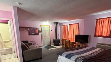 Suíte estúdio, 1 cama King, lareira | 1 quarto, Wi-Fi de cortesia, roupa de cama