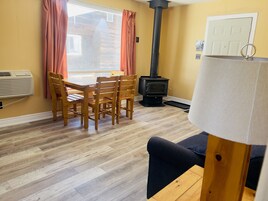 Cottage, 1 Bedroom, Fireplace | Living area | Flat-screen TV